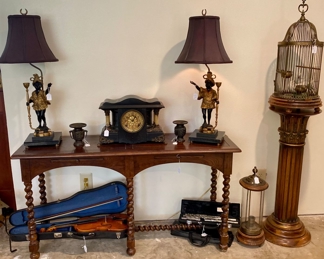 Barley twist table, bird cage and antique clock with matching McAbie Lamps