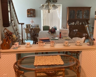 Rattan sold but tea cups and dining set available 