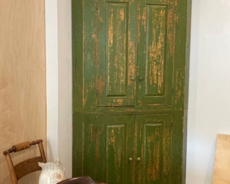 beautiful corner cabinet with well patina'd green paint