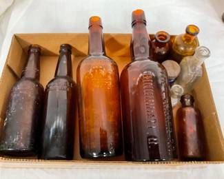 VARIOUS EARLY AMBER STORE BOTTLES
