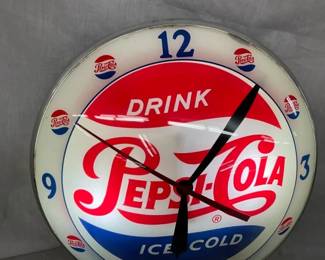 CLOSEUP PEPSI COLA CLOCK