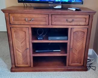 Flat screen TV entertainment cabinet