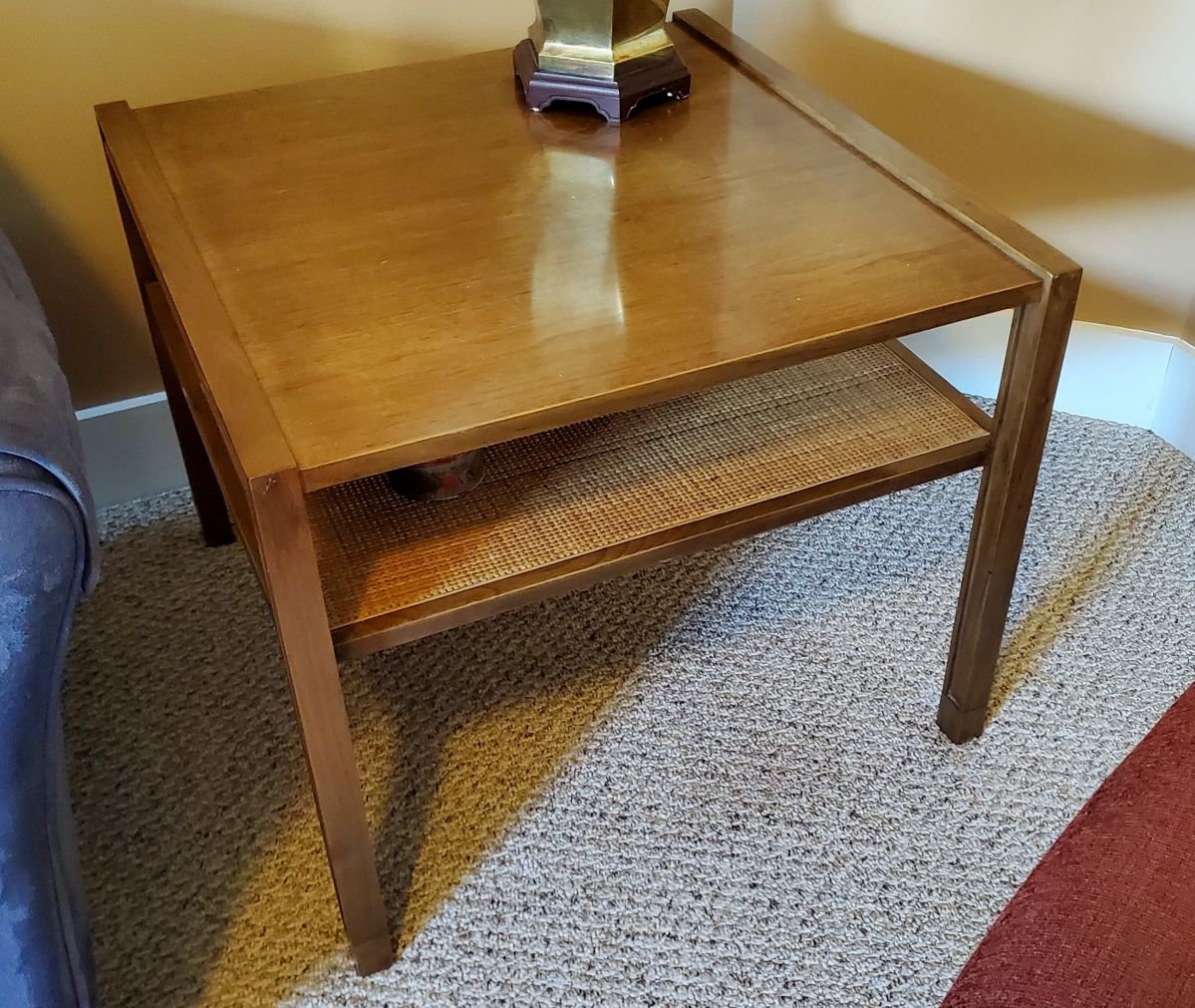 Dunbar side table with cane shelf