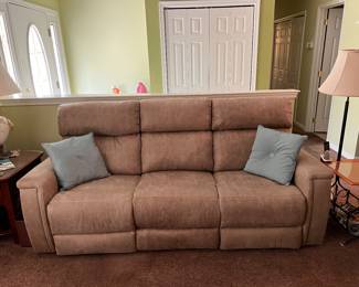 Less than six months old. Pet-free, smoke-free home! 
https://www.raymourflanigan.com/living-rooms/sofas/blake-microfiber-power-sofa-w-power-headrest-200267260