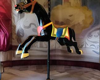 Vintage Cast Iron Carousel Horse bid $245 or bid #57