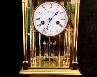 DONLAR913 Du Chateau Crystal Regulator Clock: Clock is very heavy, made of solid lacquered brass with crystal panels, 7-day wind, German movement with faux mercury pendulum, do not polish. Winding key included.
