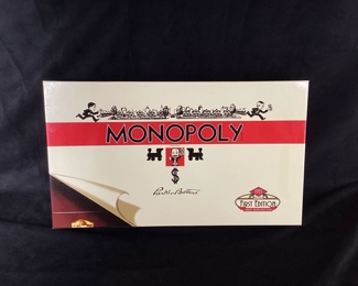 DONLAR109 Monopoly First Edition Wood Box Reproduction :This is a Monopoly first edition wood box reproduction board game. This board game comes in a quality made heavy wood case, and the contents are reproduced with original artwork. Open Box, Never Used.

