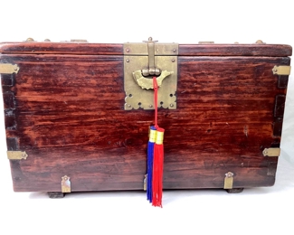 DONLAR918 Antique Korean Coin Box With Authentication Certificate: Antique elmwood chest with dark stain and very unique metal dragon lock, brass mounted hardware and unique wood joinery. 1988 receipt, business card and Antique Authentication Document are included. Note the base on which the chest rests and the lock cannot be designated as being of ancient vintage.

