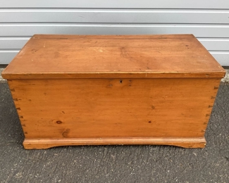 JIFI127 Antique Wood Trunk: This is an antique solid wood storage trunk. This piece has beautiful dovetail joints, visible on all sides. It also features a small drawer inside of it's storage space. Although the trunk does have a functional lock, there is no key.&nbsp;
