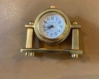 Miniature brass clock