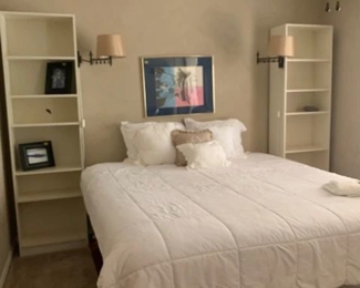 King Mattress and Frame Lamps and Tall white shelves