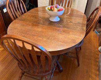 Solid Oak Dining Room Table + 2 Leaves + 6 Chairs. Solid as a rock and beautiful! 