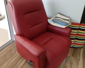 3 red swivel recliners