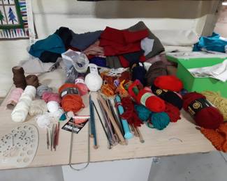 knitting, crocheting needles and yarn