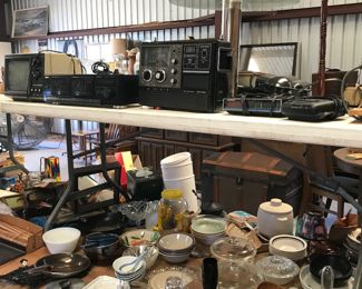 Tables and tables of vintage glassware, home decor, what nots, dishes, frames, cameras, radios etc