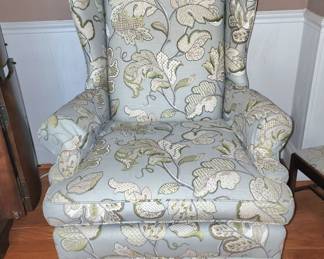 a pair of wingback chairs