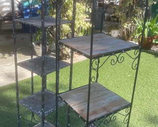 many plant racks or etagere