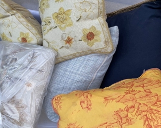 Many vintage and new pillows 