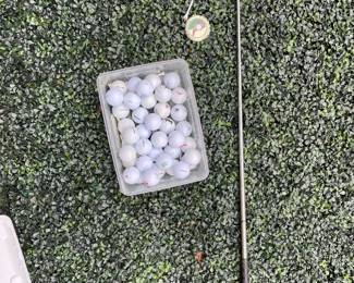 Many golf bags and a signed vintage golfclub 