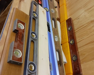 Assortment of level woodworking levels