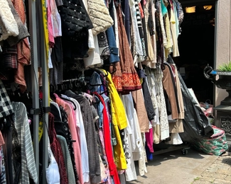 Racks and racks of clothes. Some new with tags! Sizes XS-Medium 