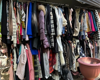 Racks and racks of clothes. Some new with tags! Sizes XS-Medium 