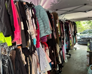 Racks and racks of clothes. Some new with tags! Sizes XS-Medium 