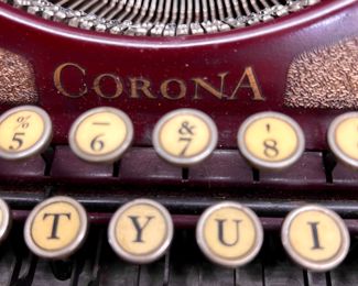 Vintage Corona typewriter with case.