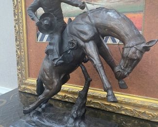 Western Bronzes after Remington and Russell