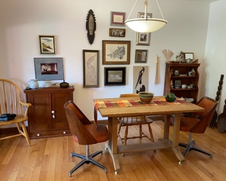 2 door antique cabinet, shelving unit, table, 2 Brody MCM Chairs, assorted art