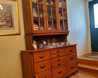 Mid-Century - Hutch.  Very different - two drawers have racks for utensils.  It is in the den at the house and looks fine there.  Has wonderful storage for a student appartement.  