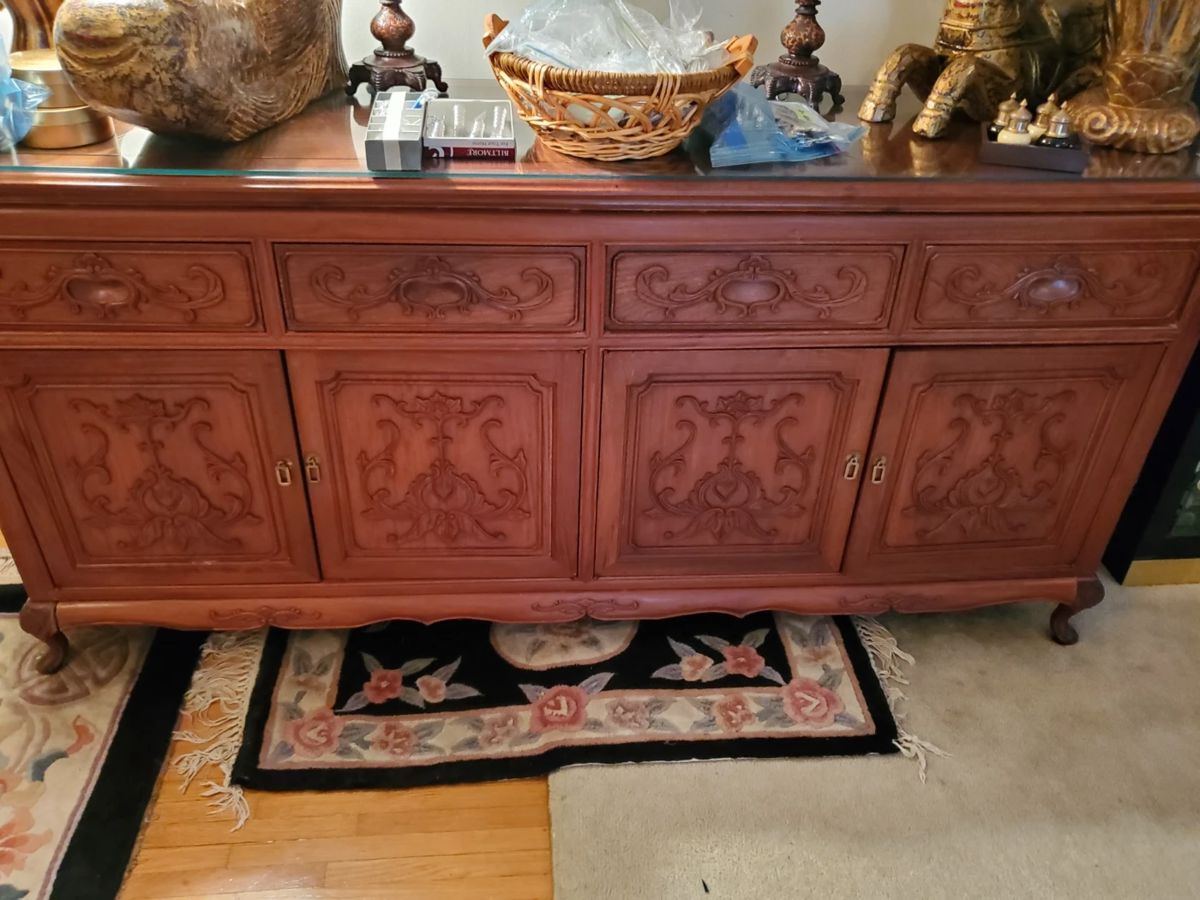 Beautiful!  Asian Influence with Brass.  Has glass across the top to protect the top.  Deep Shelves and wonderful, top drawers.