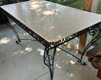 Lots of Outdoor Furniture - This one has a granite top.