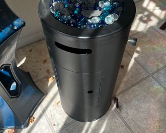 Gas fire pit with blue glass