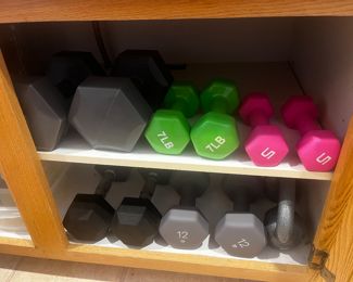 Dumb bells in sizes 5, 7,10, and 15 lbs.