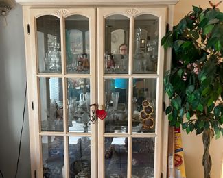 Many curio cabinets full of fun stuff 