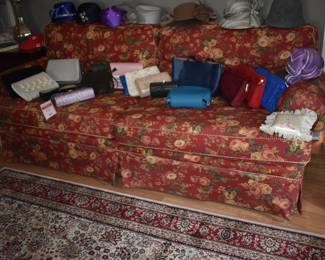 Lovely Brocade Sofa adorned with some of the Beautiful Purses and Hats in this Estate