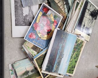 Many antique postcards including photo postcards 