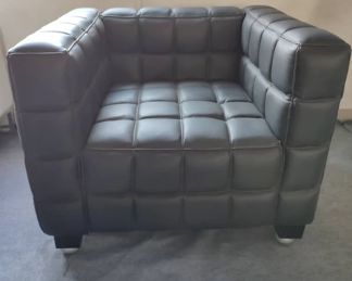 Mid-century black puffy squares studio chair 