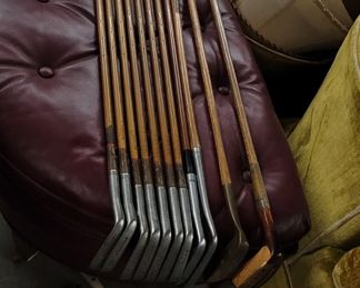 Set of antique wood grain golf clubs plus 3 hickory shaft clubs including Otey putter and St Andrew's driver