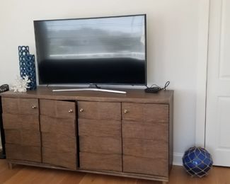 Handsome dresser-inspired entertainment cabinet by Stanley Furniture