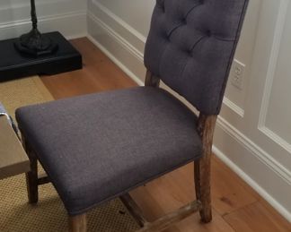 Dining set includes two upholstered chairs