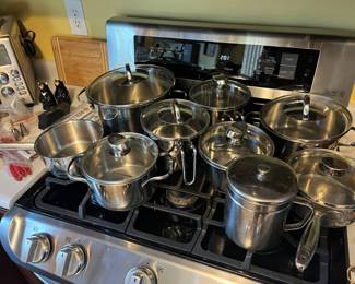 lots of quality pots and pans 