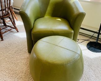 Leather Swivel Barrel Chair and Ottoman.