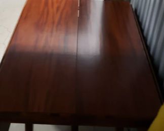 Restored Solid Wood Cherry Drop Down Table With 2 Leafs & Brass Leg Feet Covers Measures: Open 55.5"W x 38.25"D Closed 26"W Leafs 14"W x 38.25"D  $595