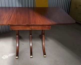 Restored Solid Wood Cherry Drop Down Table With 2 Leafs & Brass Leg Feet Covers Measures: Open 55.5"W x 38.25"D Closed 26"W Leafs 14"W x 38.25"D  $595