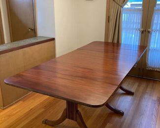 Restored Solid Wood Cherry Drop Down Table With 2 Leafs & Brass Leg Feet Covers Measures: Open 55.5"W x 38.25"D Closed 26"W Leafs 14"W x 38.25"D     $595