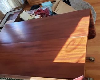 Restored Solid Wood Cherry Drop Down Table With 2 Leafs & Brass Leg Feet Covers Measures: Open 55.5"W x 38.25"D Closed 26"W Leafs 14"W x 38.25"D     $595