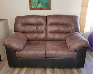 Leather LoveSeat, always covered!