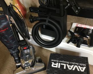 Kirby Vacuum - so many attachments it has it's own carry case! Used once or twice during the demo, then never used!